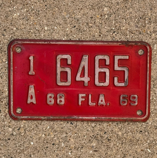 Photo of a 1968 Florida Motorcycle License Plate Auto Tag Garage Decor Vintage 1 A 6465 with original patina