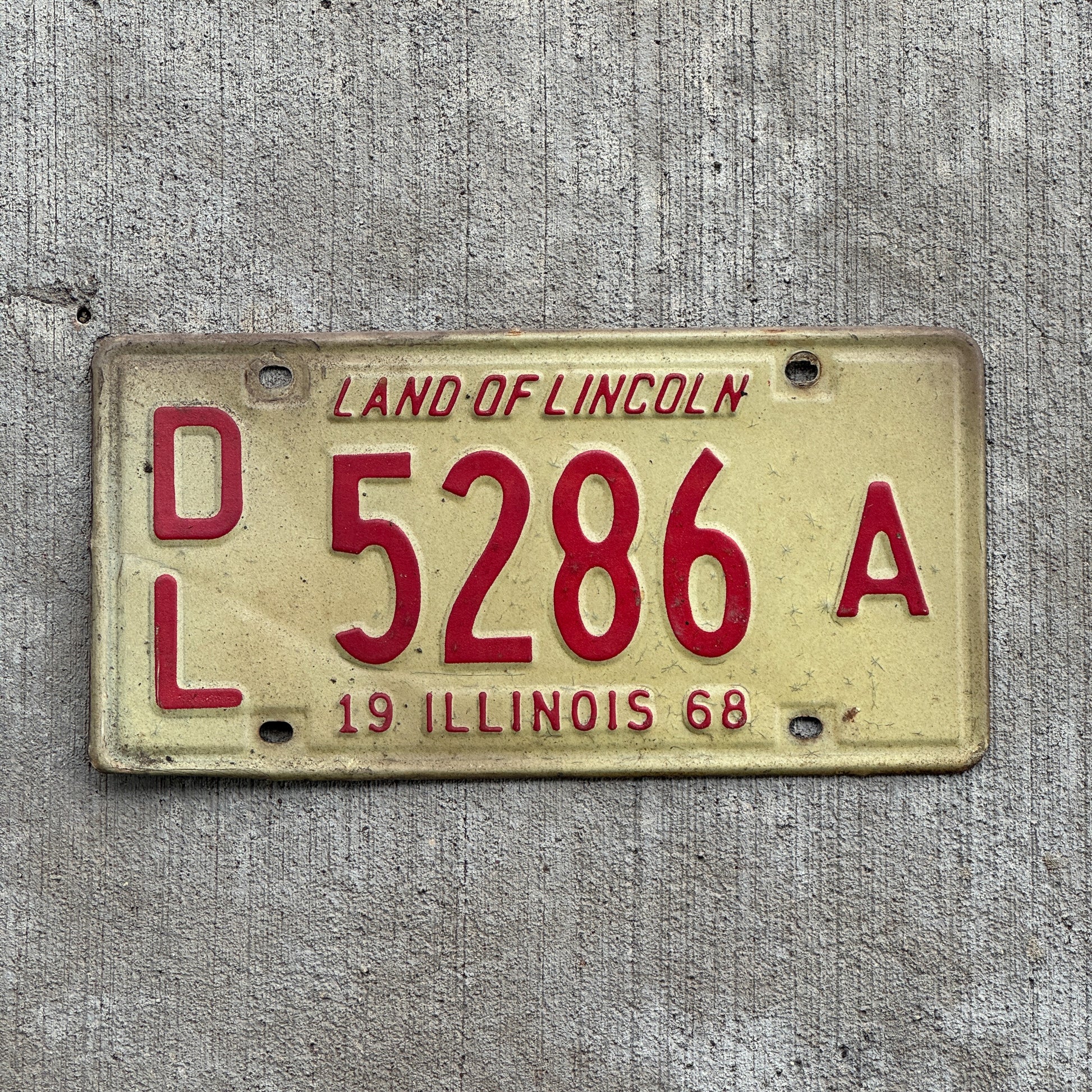 Photo of a 1968 Illinois Dealer License Plate Auto Tag 1 Vintage Garage 5286 A with original patina