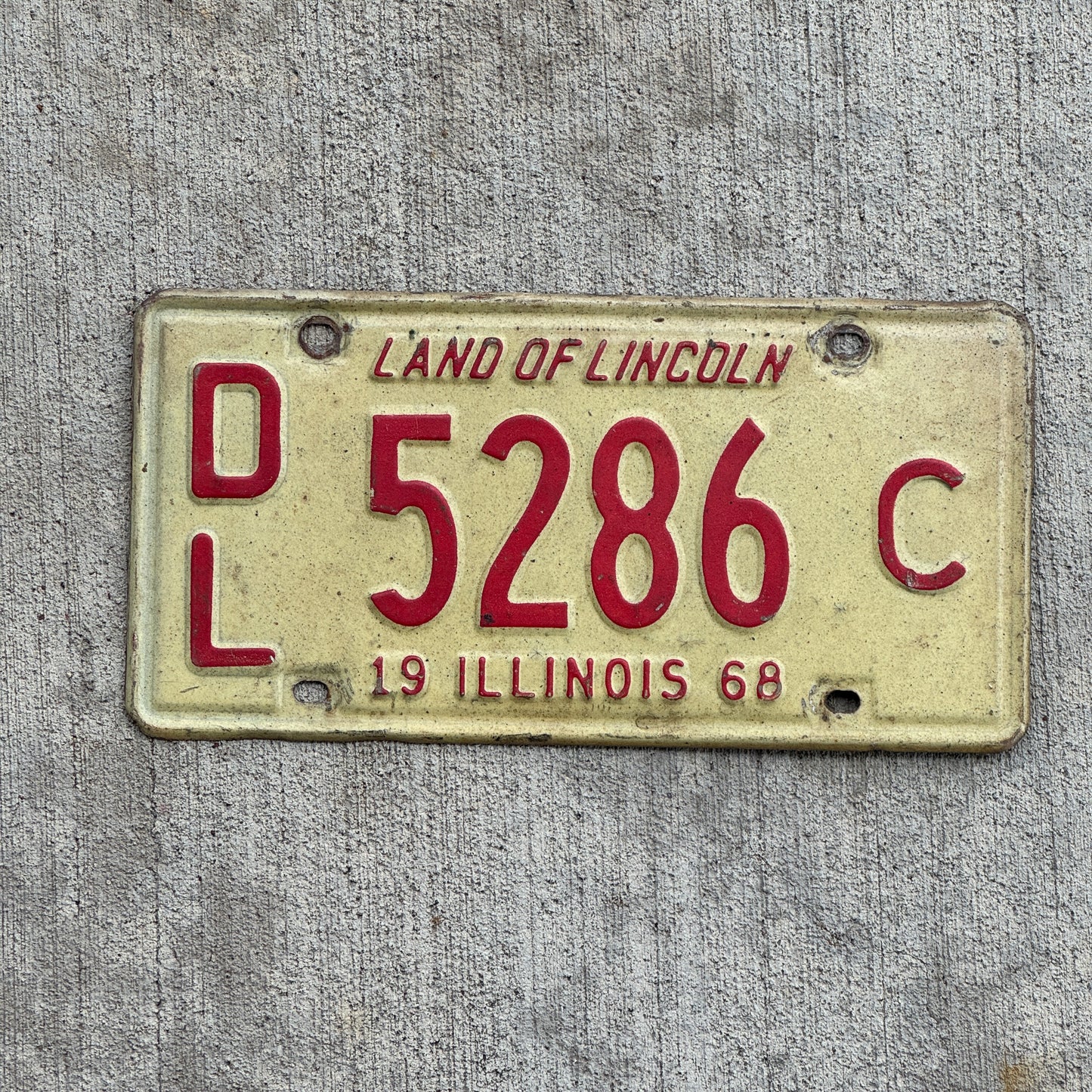 Photo of a 1968 Illinois Dealer License Plate Auto Tag 1 Vintage Garage 5286 C with original patina