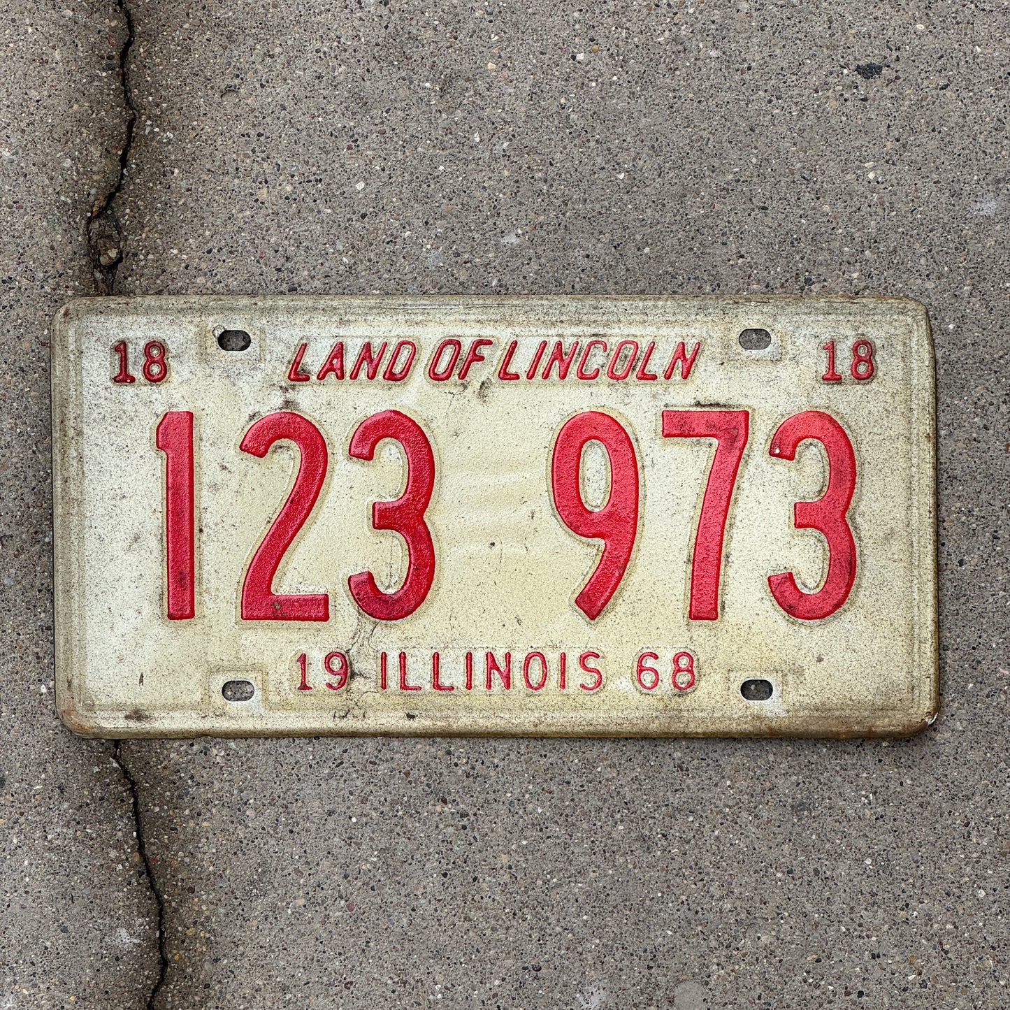 Photo of a 1968 Illinois License Plate Auto Tag 1 Vintage Garage 123 973 with original patina