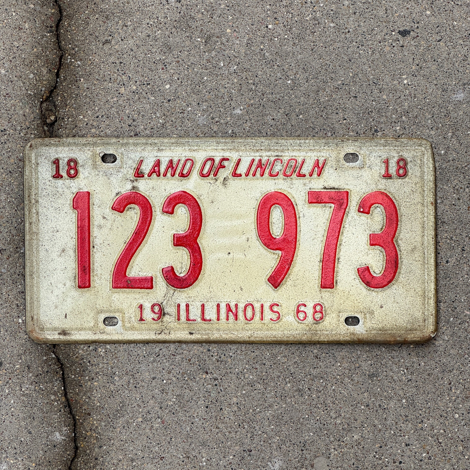 Photo of a 1968 Illinois License Plate Auto Tag 1 Vintage Garage 123 973 with original patina