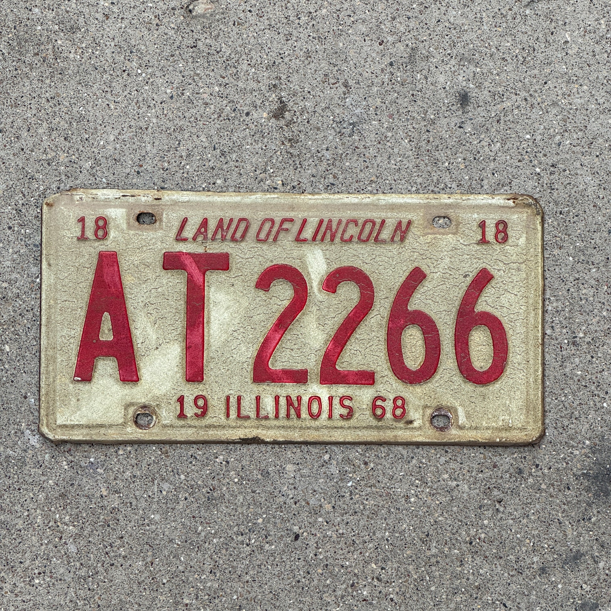 Photo of a 1968 Illinois License Plate Auto Tag 1 Vintage Garage AT 2266 with original patina