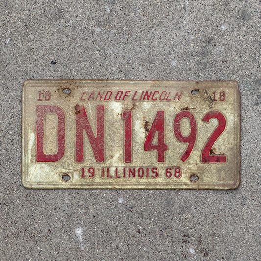 Photo of a 1968 Illinois License Plate Auto Tag 1 Vintage Garage DN 1492 with original patina