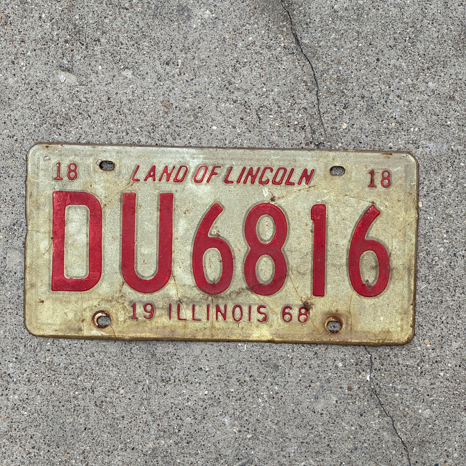Photo of a 1968 Illinois License Plate Auto Tag 1 Vintage Garage DU 6816 with original patina