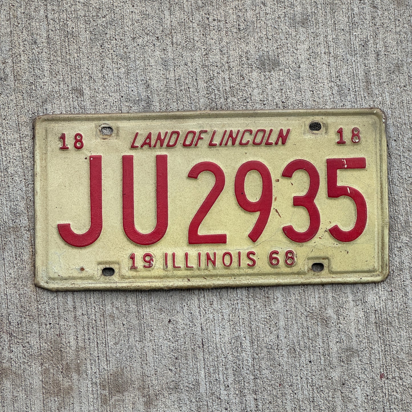 Photo of a 1968 Illinois License Plate Auto Tag 1 Vintage Garage JU 2935 with original patina