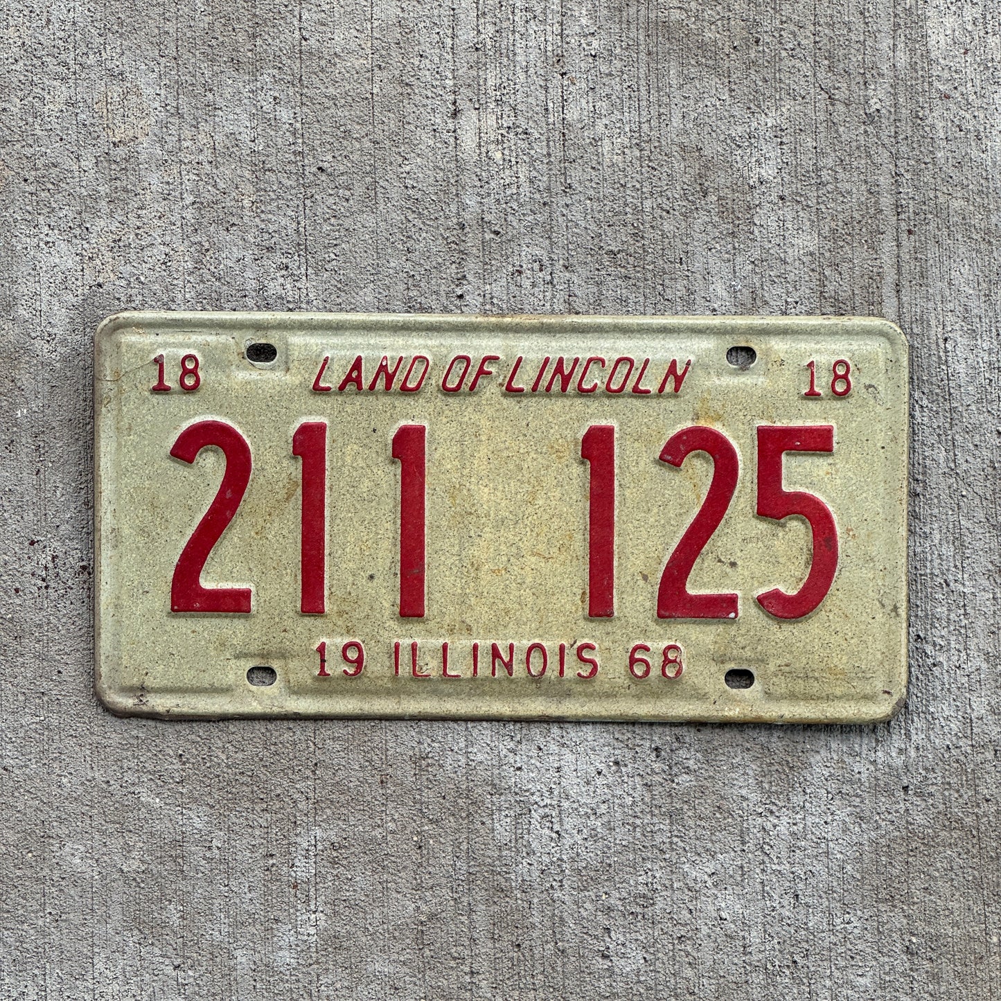 Photo of a 1968 Illinois License Plate Auto Tag 1 Vintage Garage Repeat Repeating 211 125 with original patina