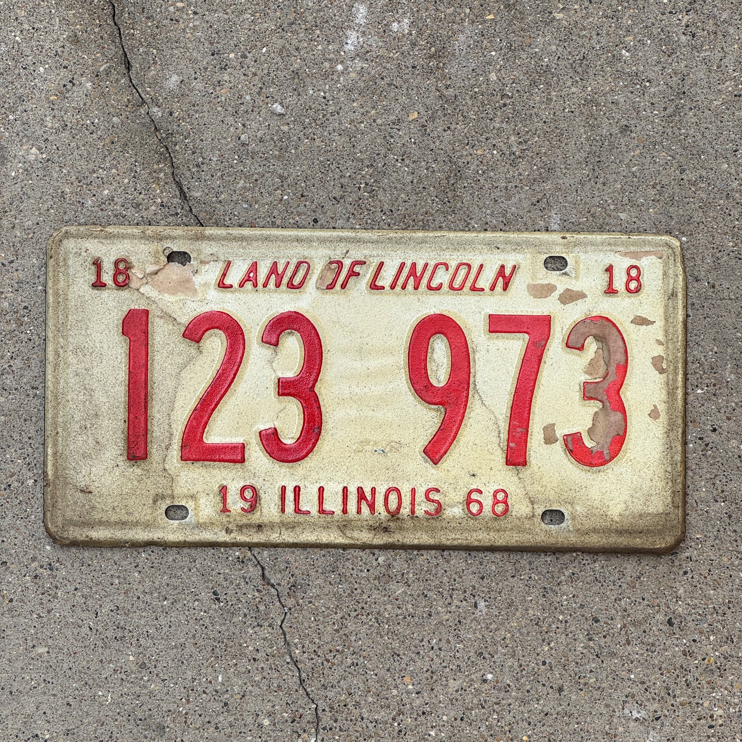 Photo of a 1968 Illinois License Plate Auto Tag 2 Vintage Garage 123 973 with original patina