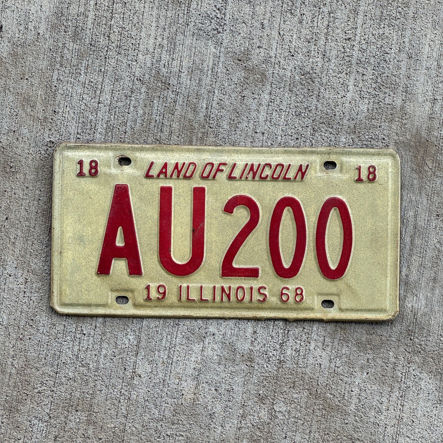 Photo of a 1968 Illinois License Plate Auto Tag 2 Vintage Garage AU 200 with original patina