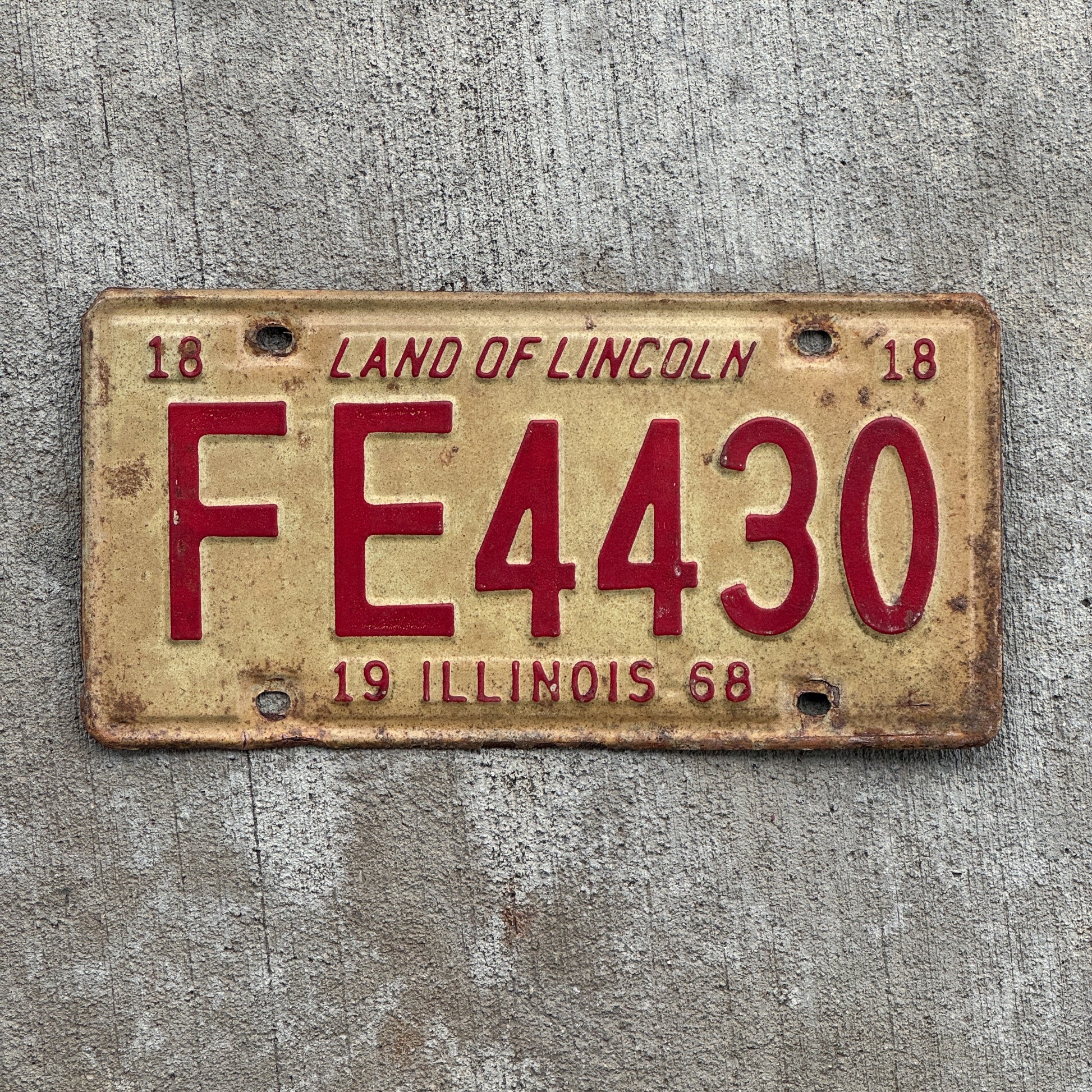 Photo of a 1968 Illinois License Plate Auto Tag 2 Vintage Garage FE 4430 with original patina