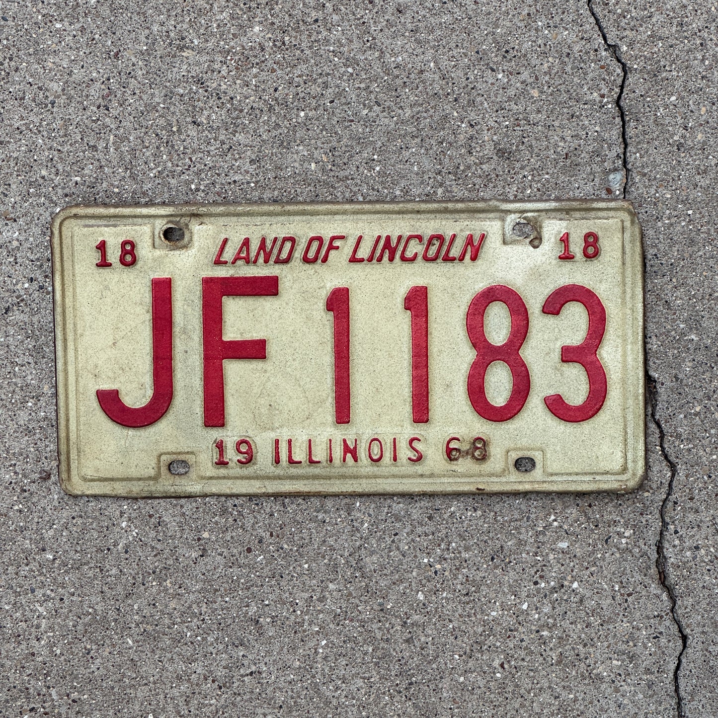 Photo of a 1968 Illinois License Plate Auto Tag 2 Vintage Garage JF 1183 with original patina