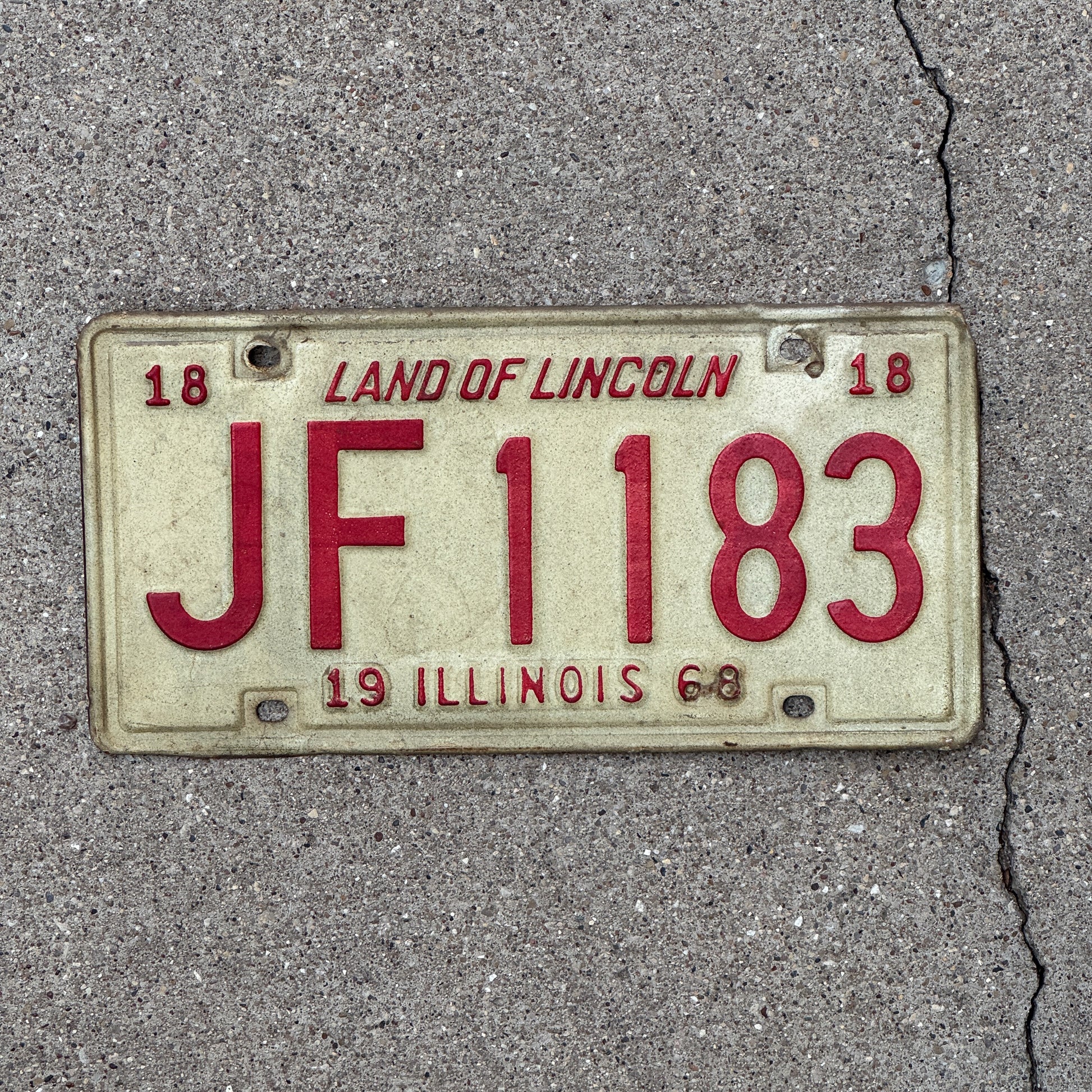 Photo of a 1968 Illinois License Plate Auto Tag 2 Vintage Garage JF 1183 with original patina