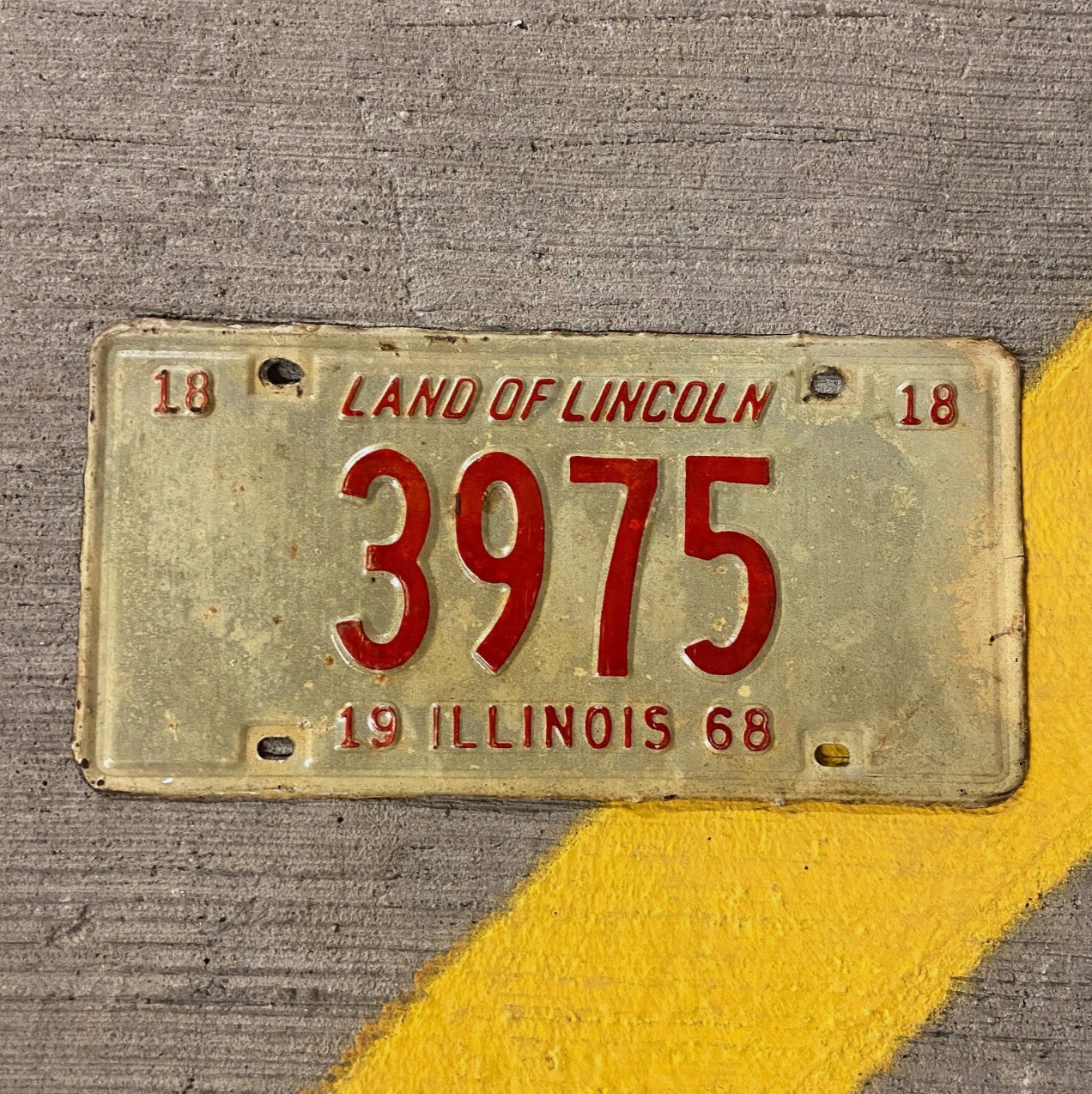 Photo of a 1968 Illinois License Plate Auto Tag Garage Decor Vintage Low Number Four Digit 3975 with original patina