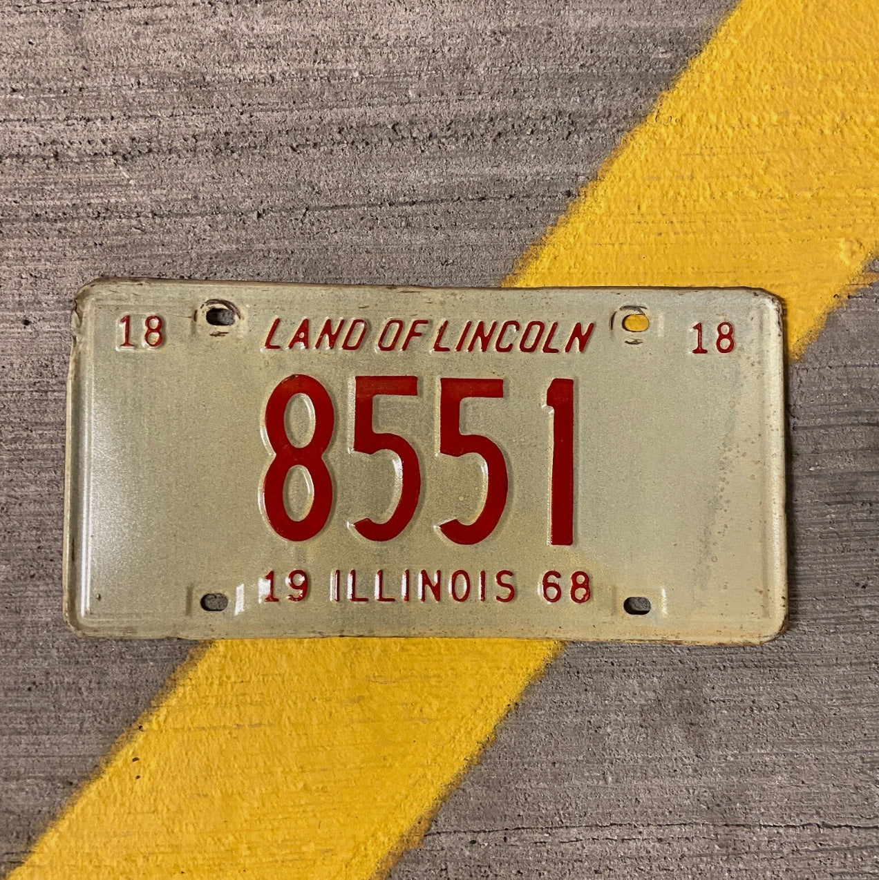 Photo of a 1968 Illinois License Plate Auto Tag Garage Decor Vintage Low Number Four Digit 8551 with original patina