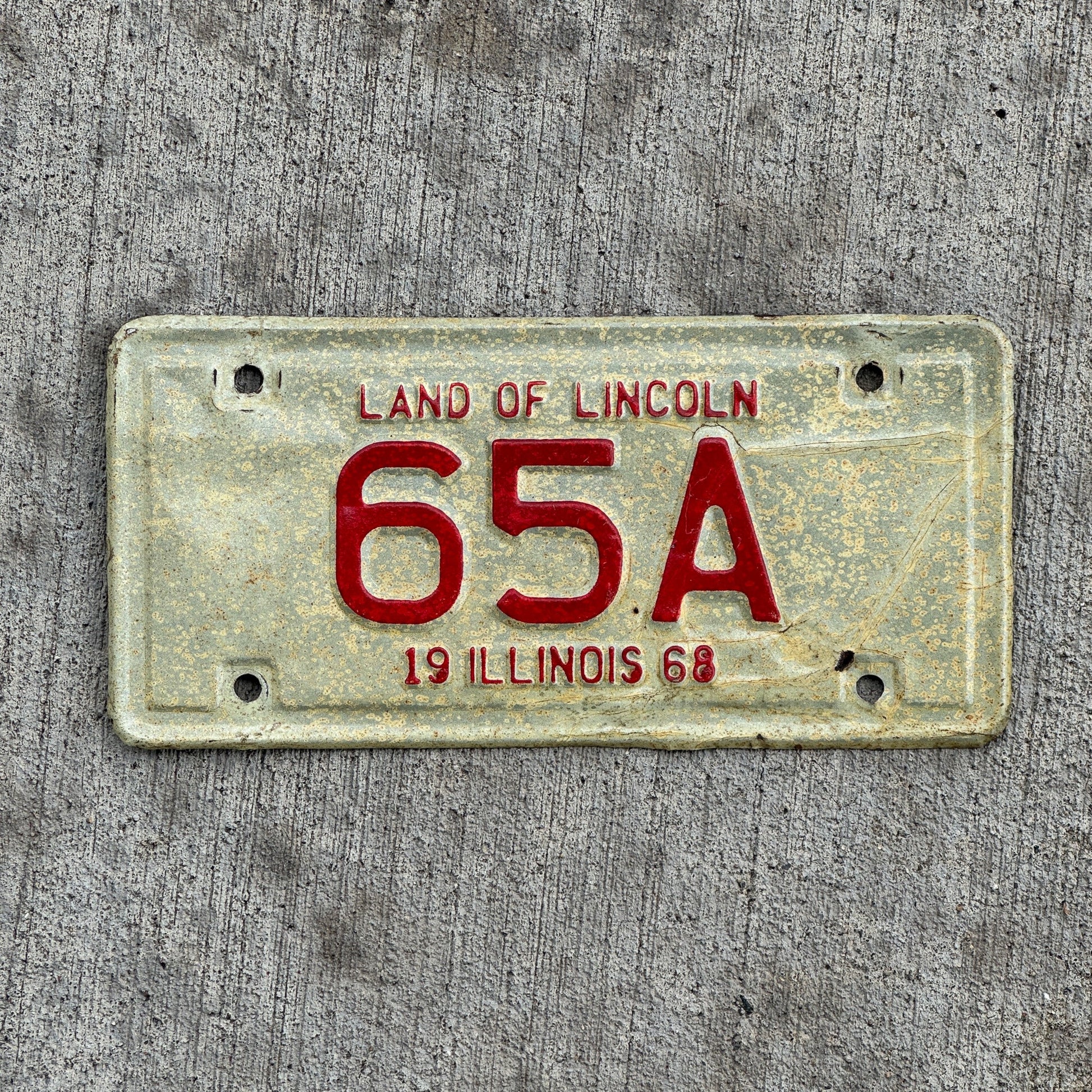 Photo of a 1968 Illinois Moped License Plate Auto Tag Garage Decor Vintage Two Digit First Year of Type 65 A with original patina