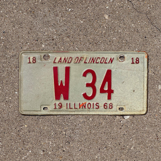 Photo of a 1968 Illinois Trailer License Plate Auto Tag Garage Decor Vintage Low Number Two Digit W 34 with original patina