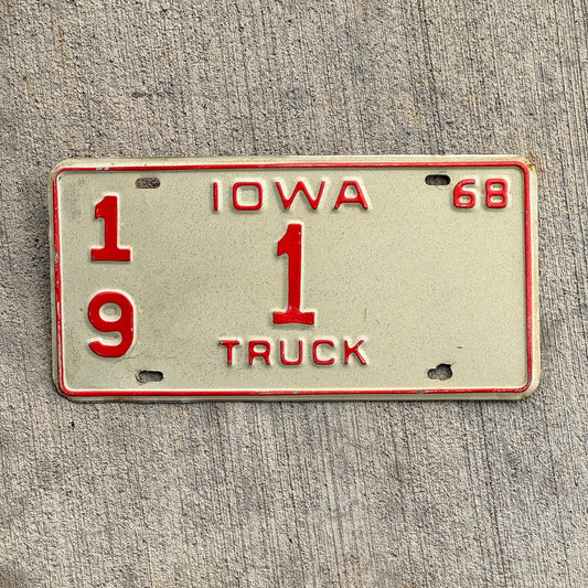 Photo of a 1968 Iowa Truck License Plate Auto Tag 2 Vintage Garage Low Number Single Digit Chickasaw County 19 1 with original patina