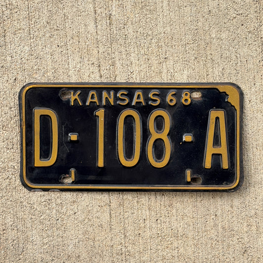 Photo of a 1968 Kansas Dealer License Plate Auto Tag Garage Decor Vintage D 108 A with original patina