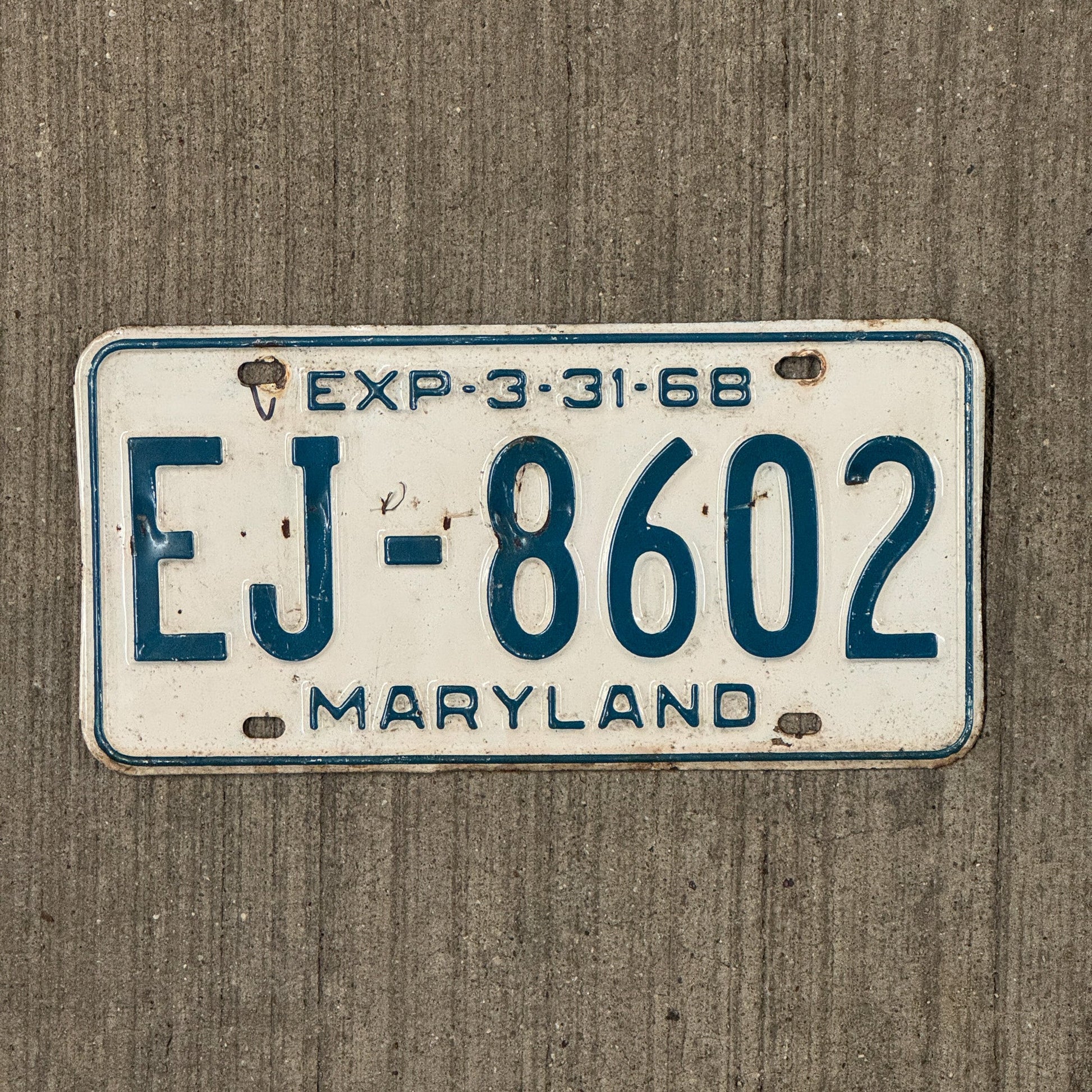 Photo of a 1968 Maryland License Plate Auto Tag Garage Decor Vintage EJ 8602 with original patina