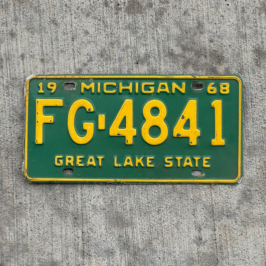 Photo of a 1968 Michigan License Plate Auto Tag Garage Decor Vintage FG 4841 with original patina
