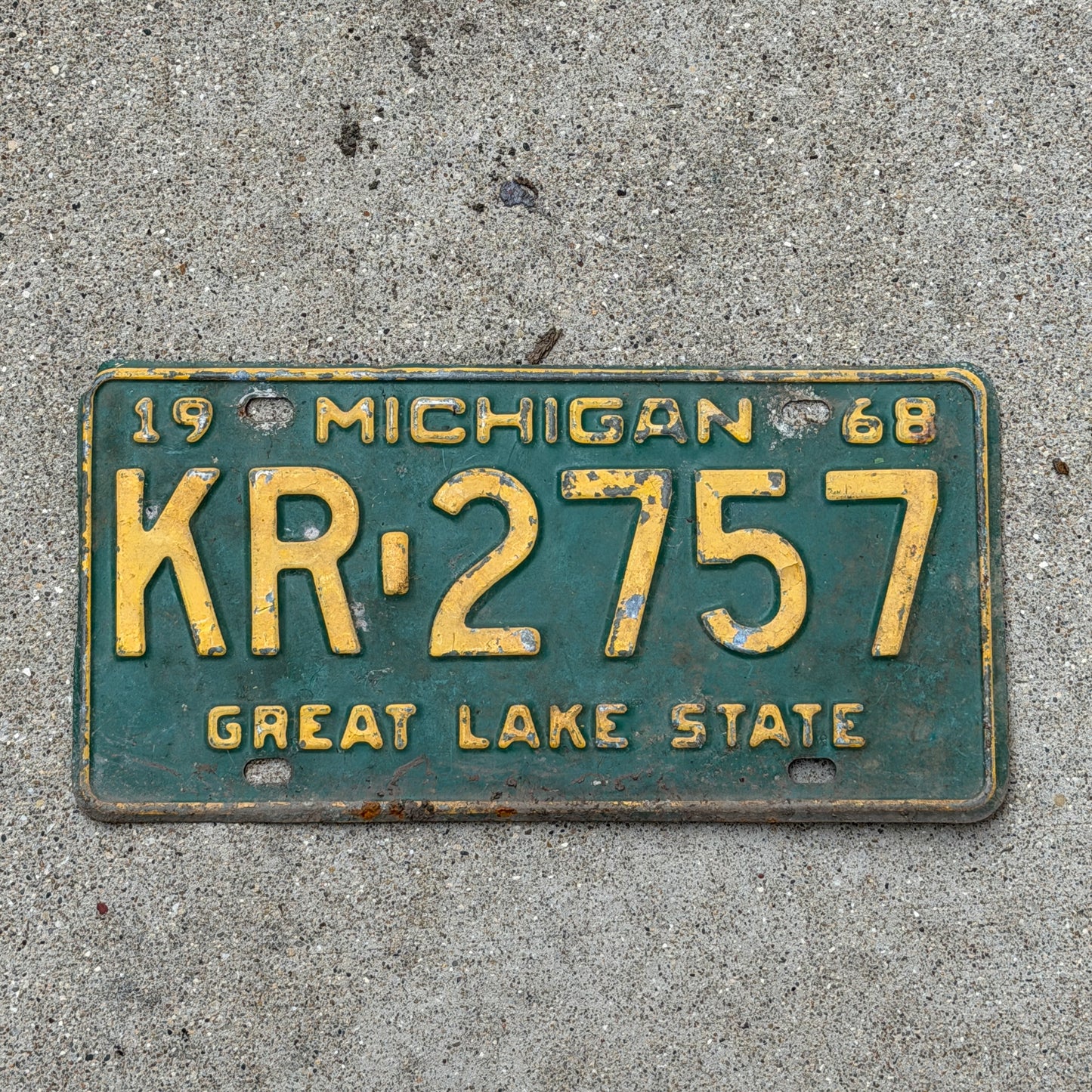 Photo of a 1968 Michigan License Plate Auto Tag Garage Decor Vintage KR 2757 with original patina