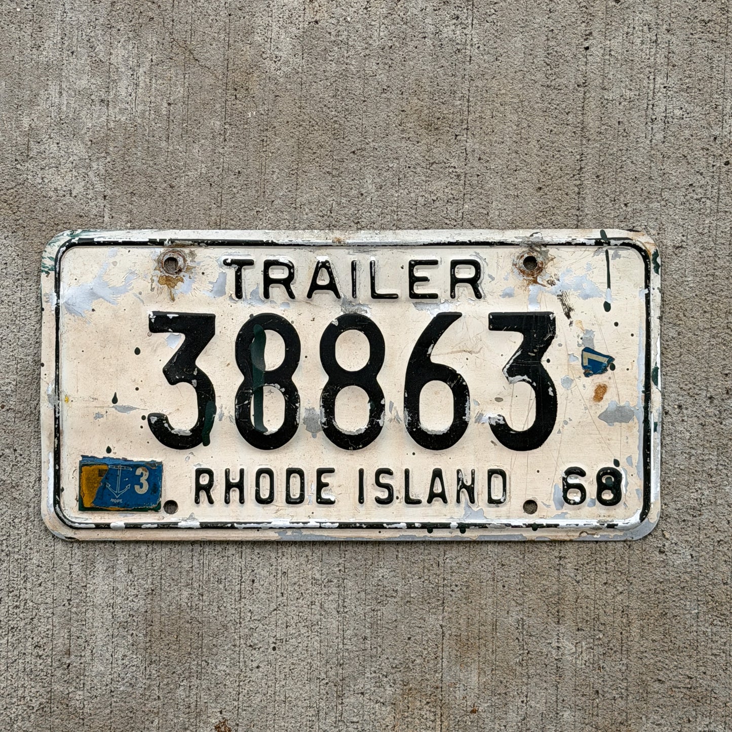 Photo of a 1968 Rhode Island Trailer License Plate Auto Tag Garage Decor Vintage 38863 with original patina