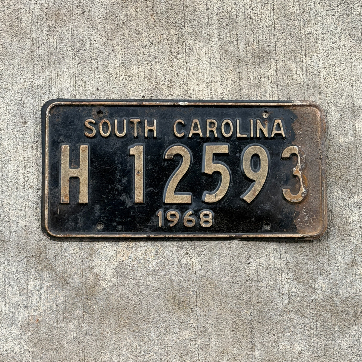 Photo of a 1968 South Carolina Truck License Plate Auto Tag Garage Decor Vintage H 12593 with original patina