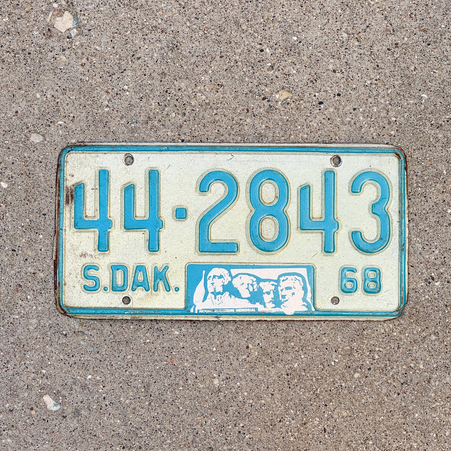 Photo of a 1968 South Dakota License Plate Auto Tag Garage Decor Vintage Mount Rushmore 44 2843 with original patina