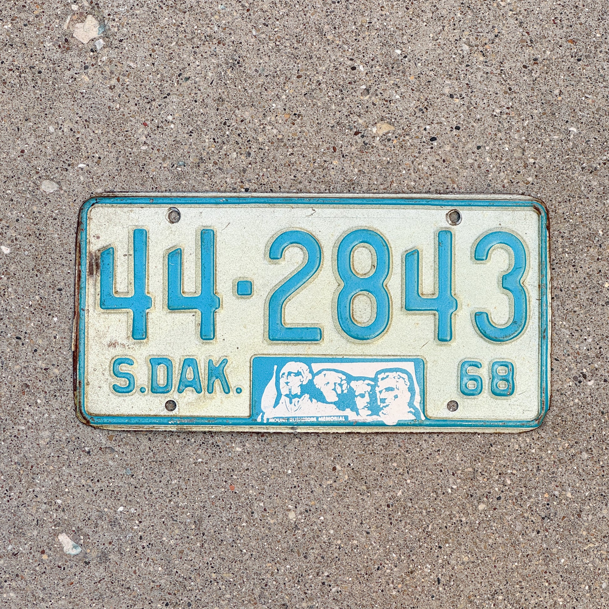 Photo of a 1968 South Dakota License Plate Auto Tag Garage Decor Vintage Mount Rushmore 44 2843 with original patina