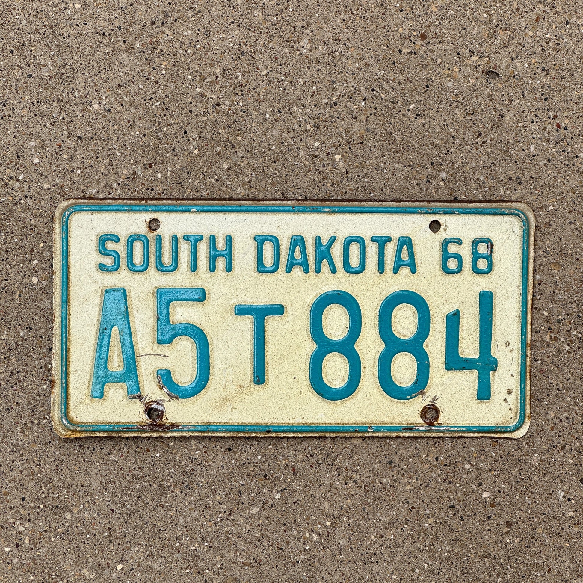 Photo of a 1968 South Dakota TRUCK License Plate Auto Tag Garage Decor Vintage A5 T 884