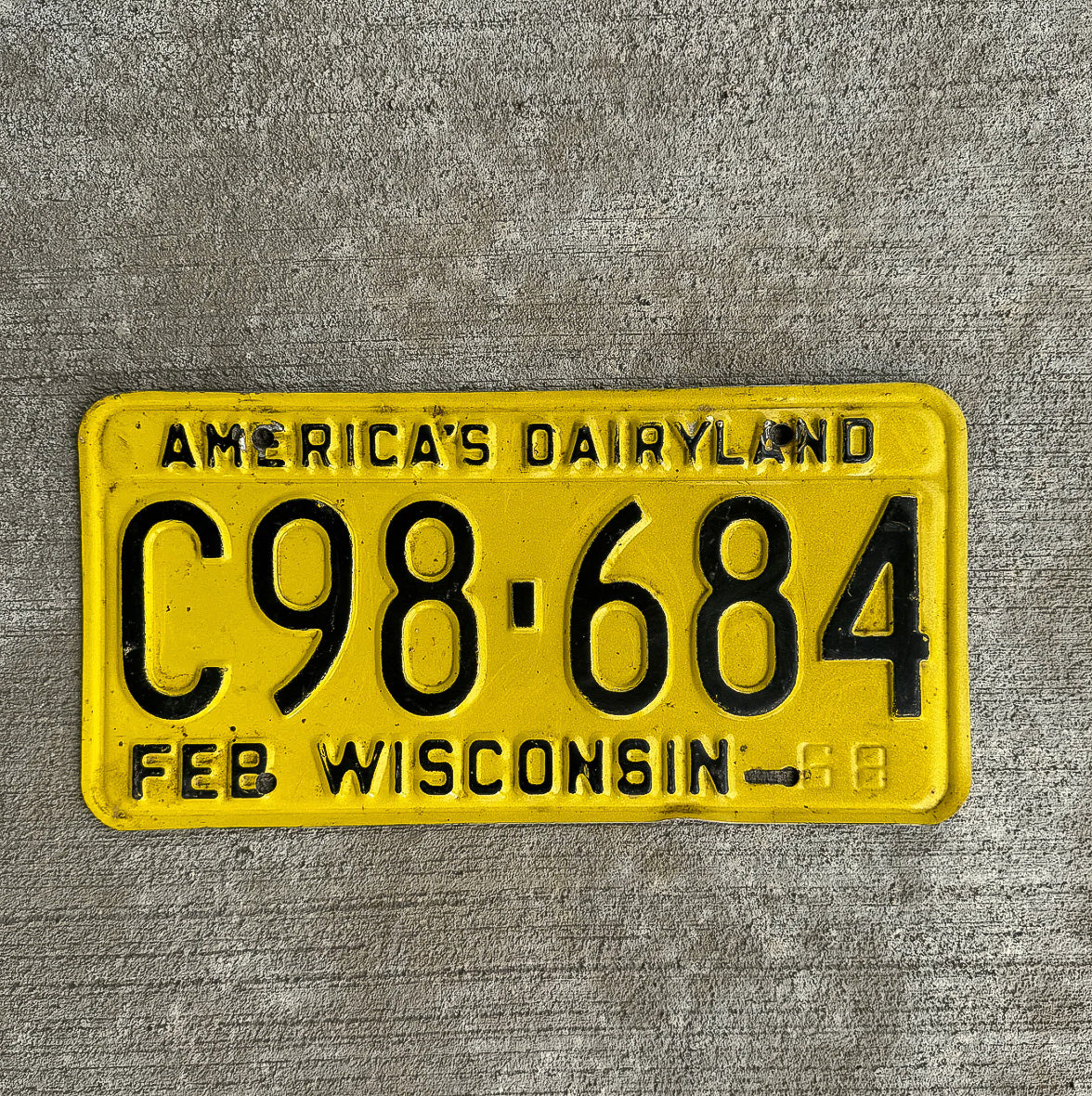 Photo of a 1968 Wisconsin License Plate Auto Tag Garage Decor Vintage C 98 684 with original patina