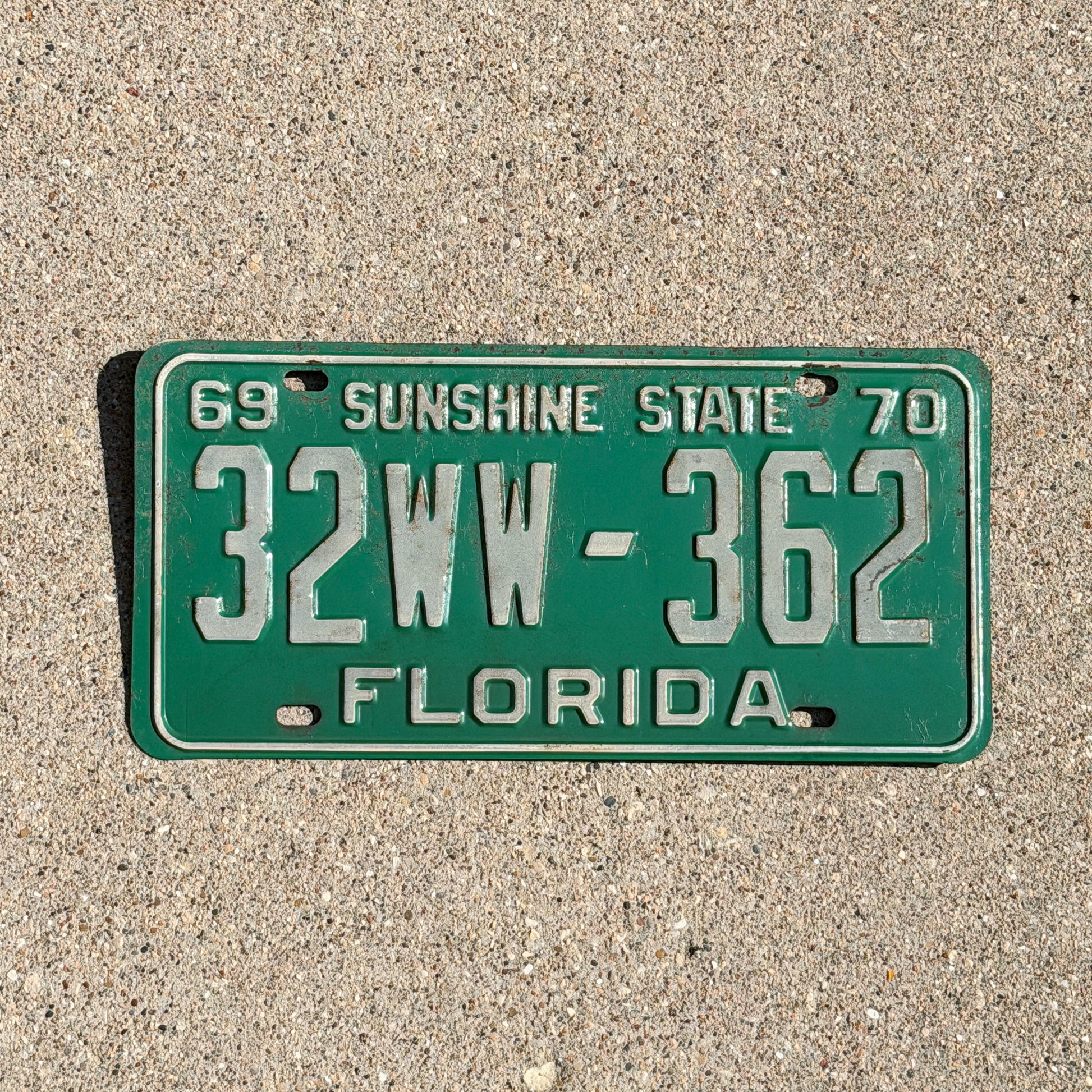 Photo of a 1969 1970 Florida License Plate Auto Tag Garage Decor Vintage 32 WW 362 with original patina