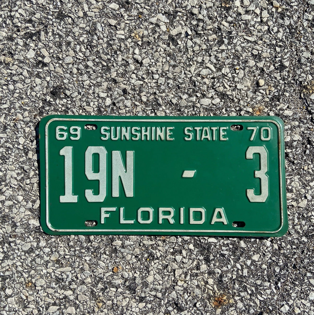 Photo of a 1969 1970 Florida Trailer for Hire License Plate Auto Tag Garage Decor Vintage Low Number Brevard County 19 N 3 with original patina