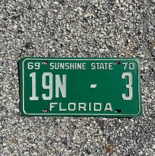 Photo of a 1969 1970 Florida Trailer for Hire License Plate Auto Tag Garage Decor Vintage Low Number Brevard County 19 N 3 with original patina