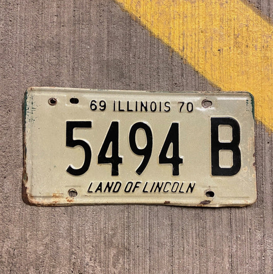 Photo of a 1969 1970 Illinois Truck License Plate Auto Tag 2 Vintage Garage 5494 B with original patina