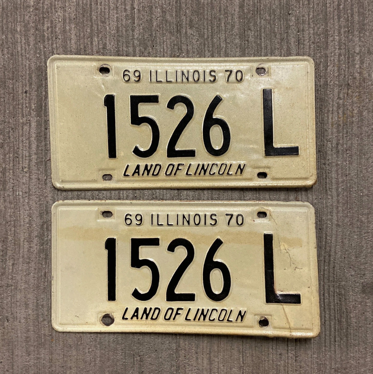 Photo of a 1969 1970 Illinois Truck License Plate Pair Auto Tag Garage Decor Vintage 1526 L with original patina