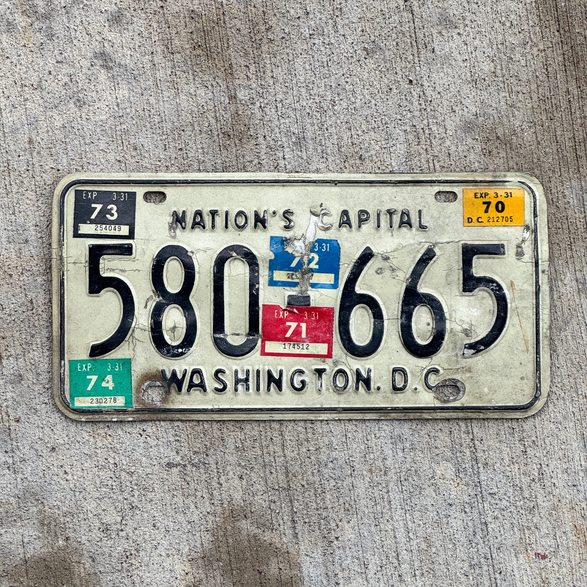 Photo of a 1969 1974 Washington DC License Plate Auto Tag Garage Decor Vintage 580 665 with original patina