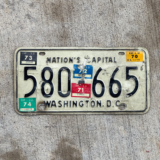 Photo of a 1969 1974 Washington DC License Plate Auto Tag Garage Decor Vintage 580 665 with original patina