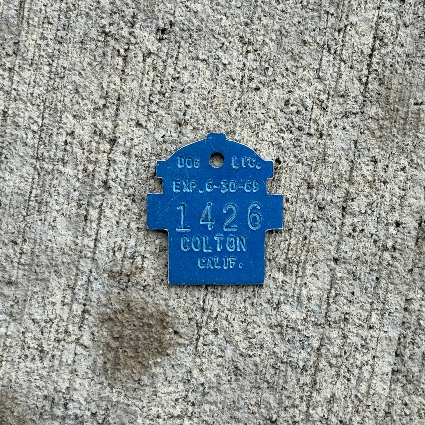 Photo of a 1969 California Dog License Auto Tag Garage Decor Vintage Colton 1426 with original patina
