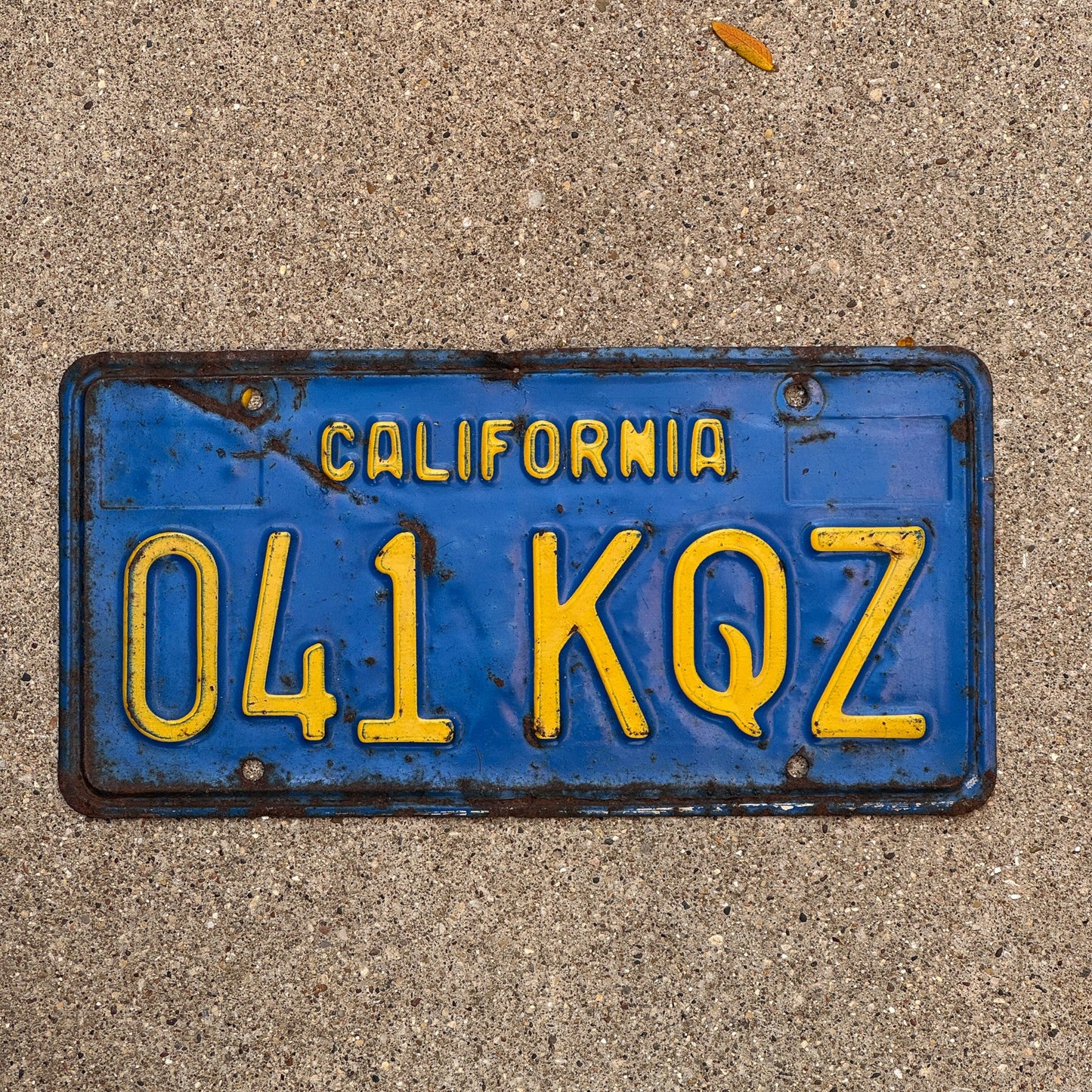Photo of a 1969 California License Plate Auto Tag Garage Decor Vintage Blue 041 KQZ with original patina