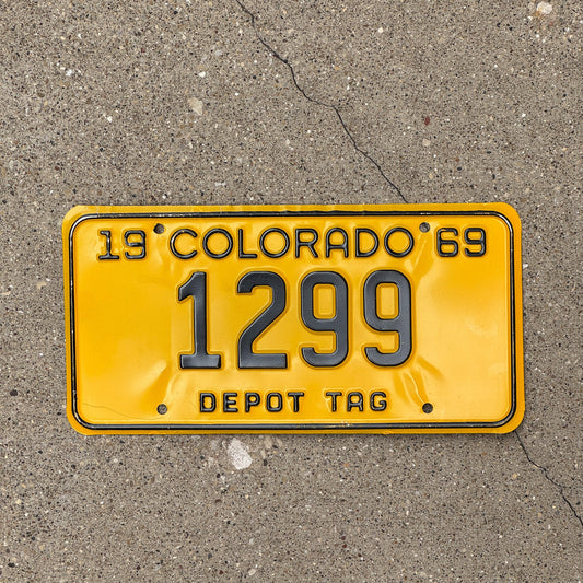 Photo of a 1969 Colorado Depot Tag License Plate Auto Tag Garage Decor Vintage 1299