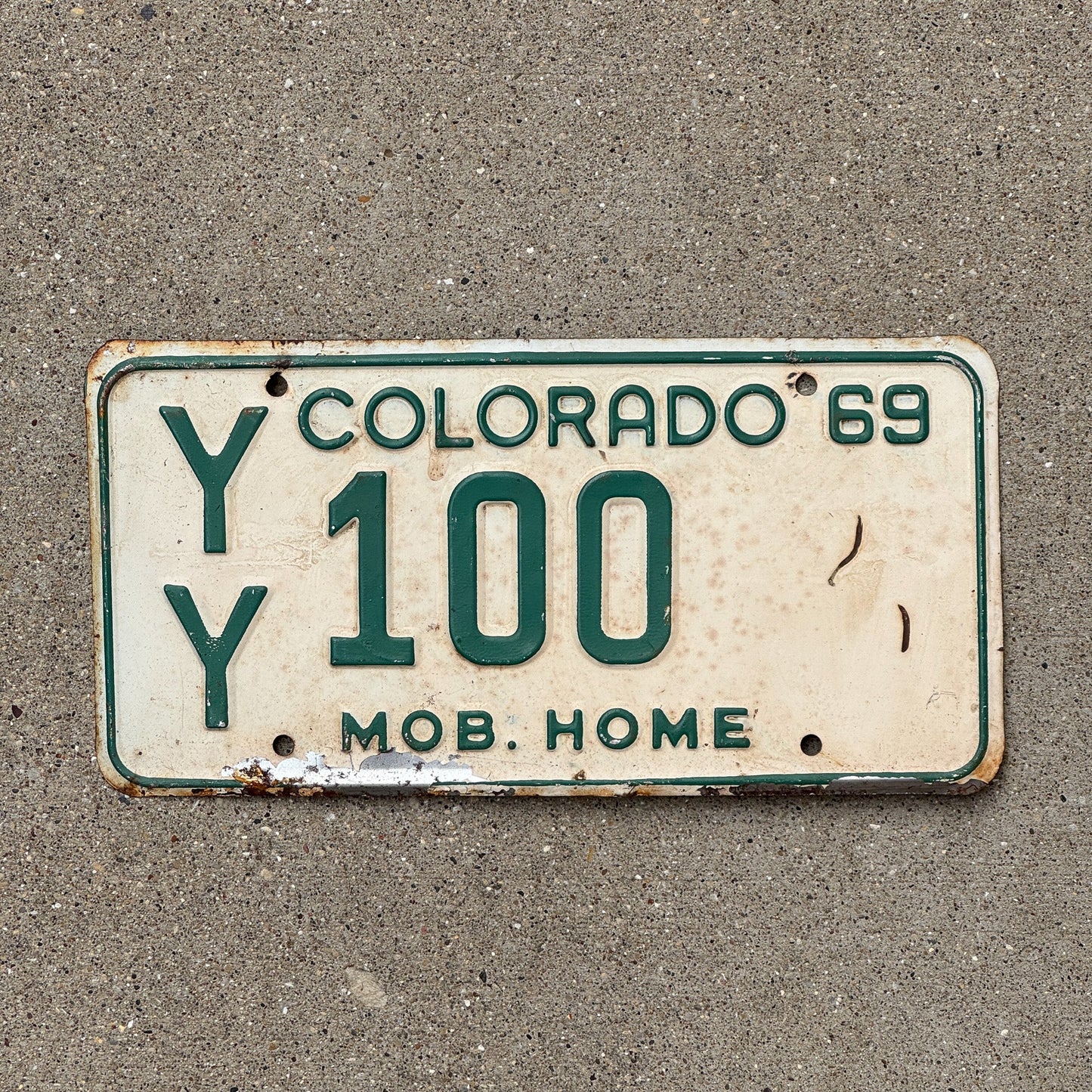 Photo of a 1969 Colorado Mobile Home License Plate Auto Tag Garage Decor Vintage YY 100
