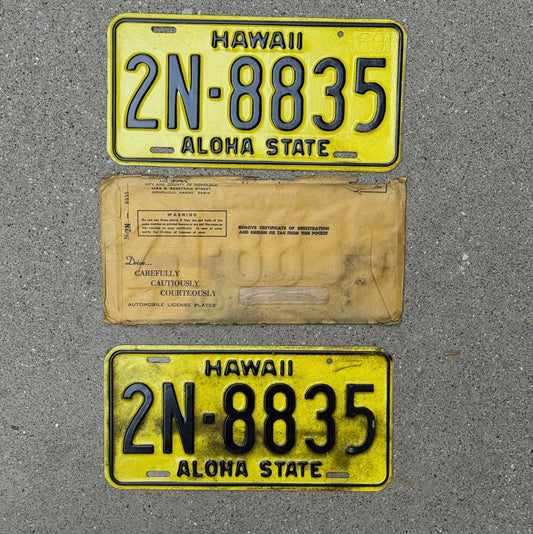 Photo of a 1969 Hawaii License Plate Pair Auto Tag Garage Decor Vintage New Old Stock With Envelope Honolulu County 2N 8835 with original patina
