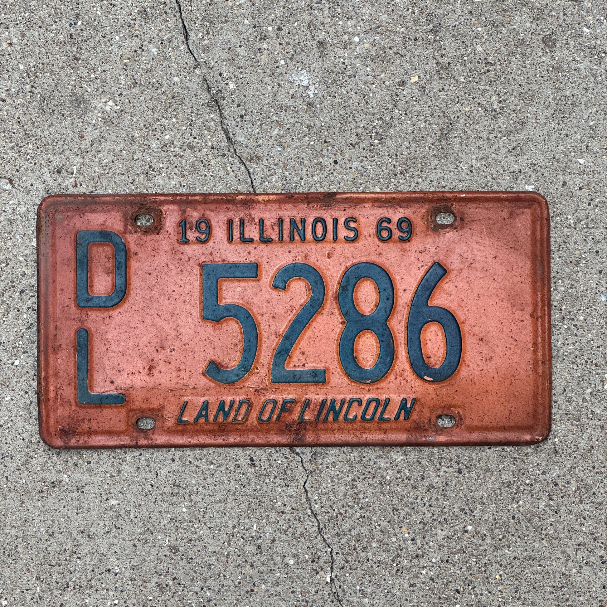 Photo of a 1969 Illinois Dealer License Plate Auto Tag 1 Vintage Garage 5286 with original patina