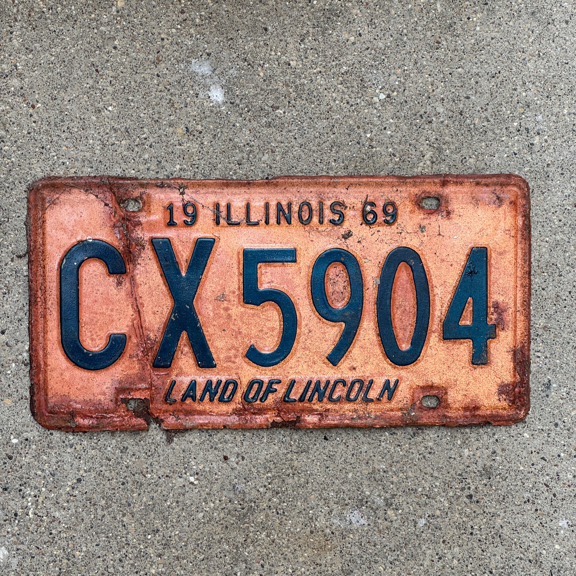 Photo of a 1969 Illinois License Plate Auto Tag 1 Vintage Garage CX 5904 with original patina