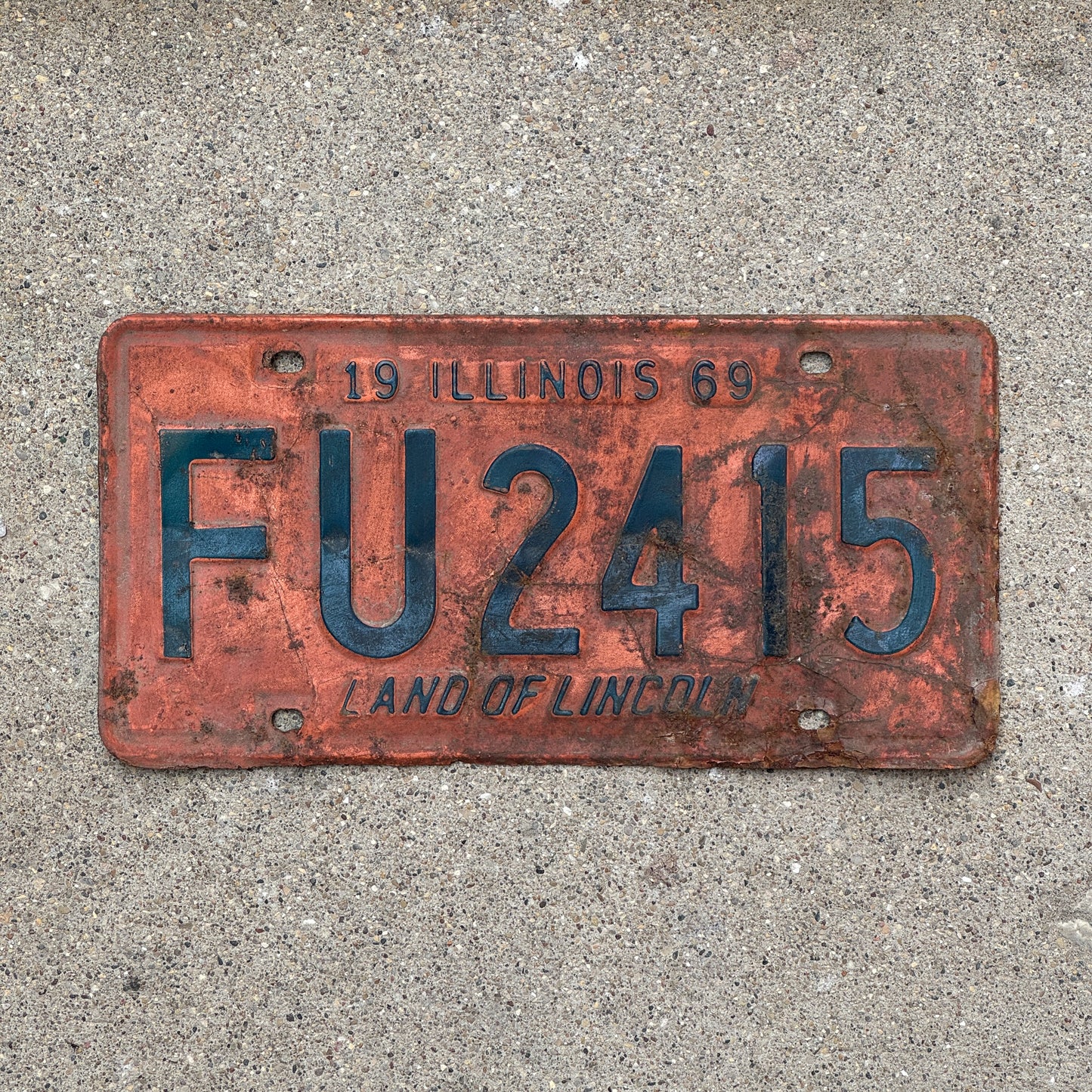 Photo of a 1969 Illinois License Plate Auto Tag 1 Vintage Garage FU 2415 with original patina