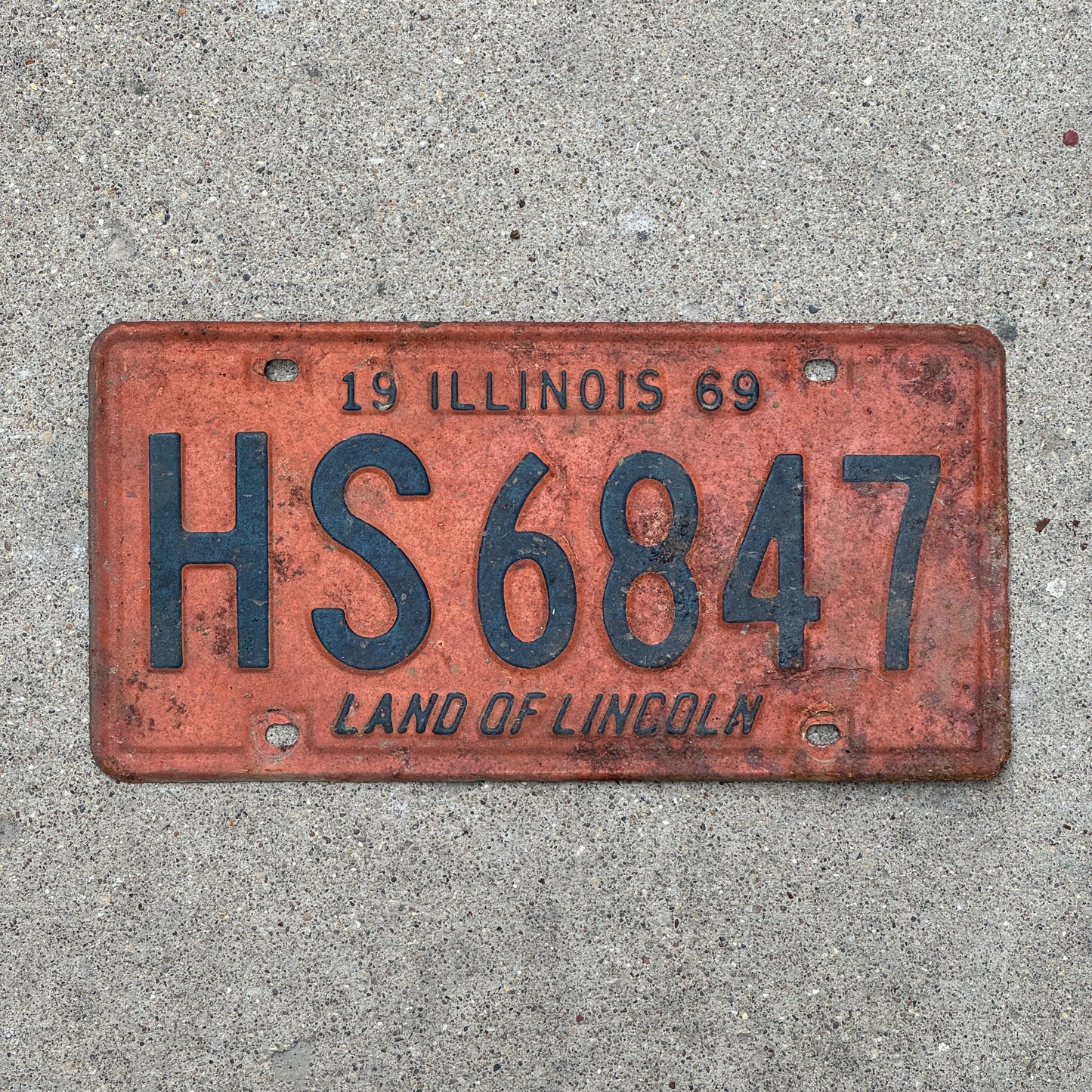 Photo of a 1969 Illinois License Plate Auto Tag 1 Vintage Garage HS 6847 with original patina