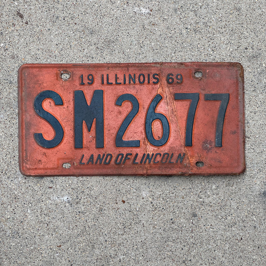 Photo of a 1969 Illinois License Plate Auto Tag 1 Vintage Garage SM 2677 with original patina