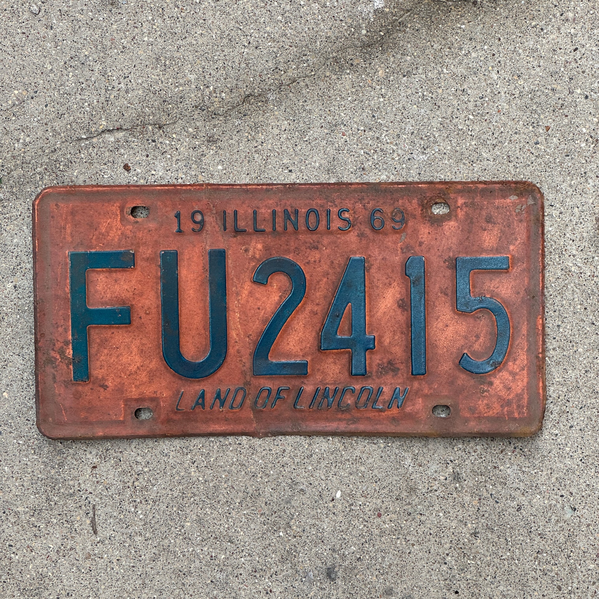 Photo of a 1969 Illinois License Plate Auto Tag 2 Vintage Garage FU 2415 with original patina