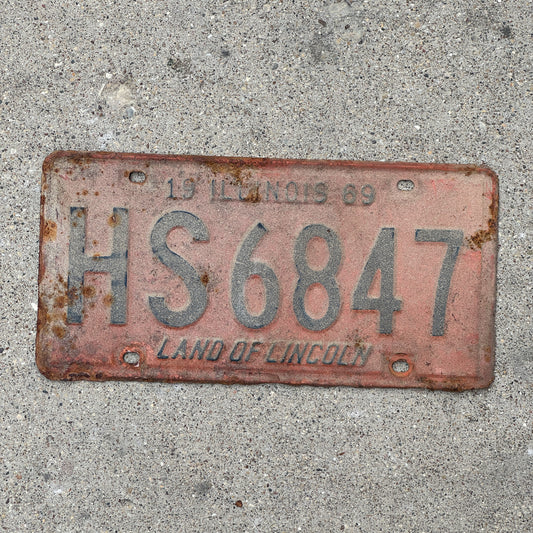 Photo of a 1969 Illinois License Plate Auto Tag 2 Vintage Garage HS 6847 with original patina