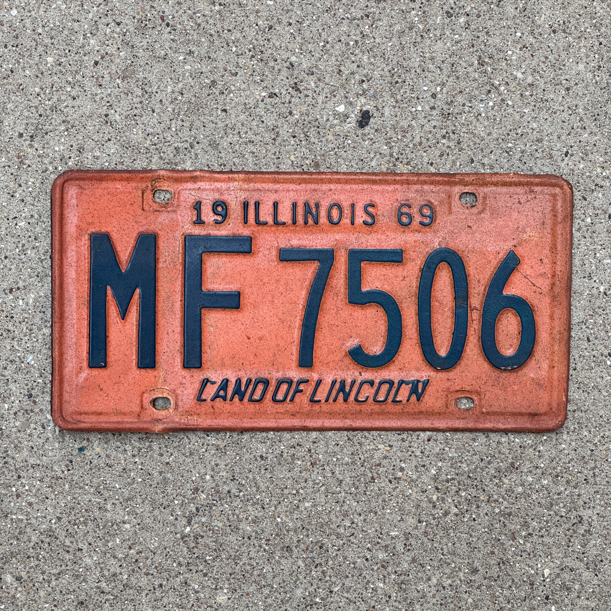 Photo of a 1969 Illinois License Plate Auto Tag 2 Vintage Garage MF 7506 with original patina